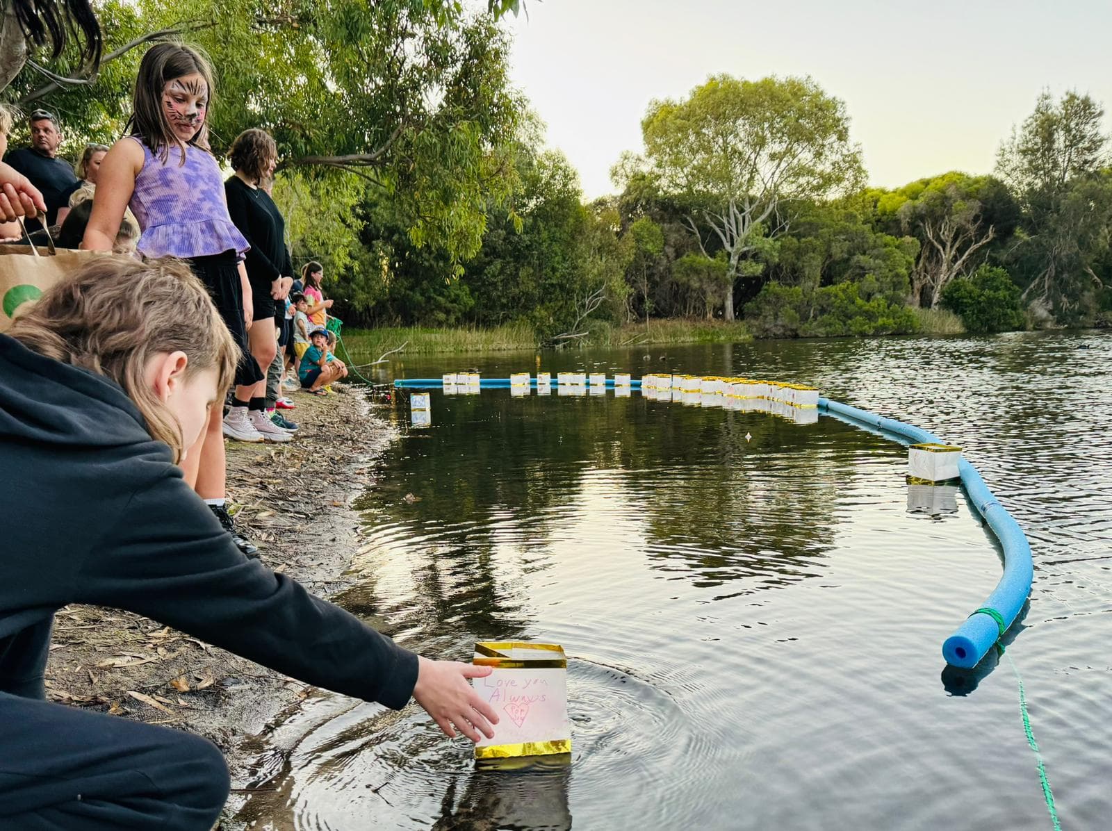 Volunteers supporting grieving families at Lionheart Camp for Kids